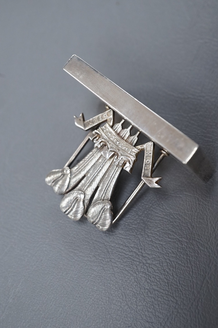 An Edwardian silver candle snuffer, possible Goldsmiths & Silversmiths Co Ltd, London, 1909, 29.9cm, a Victorian silver mounted glass cayenne pepper jar and white metal(tests as silver) menu holder, with Prince of Wales